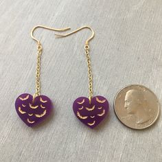 When you are spooky AF, but also want to rock delicate, dainty earrings. Also, bats!! On 14k gold plated sterling silver hooks, so perfect for sensitive ears. Pictures do not do the beauty of these justice. 1.75in long 0.75in wide Spooky Jewelry With Ear Wire For Gift, Heart-shaped Halloween Party Earrings, Halloween Party Heart-shaped Earrings, Gold Dangle Halloween Jewelry, Gold Dangle Jewelry For Halloween, Halloween Gold Dangle Jewelry, Gold Jewelry For Halloween, Three Ear Piercings, Bat Earrings