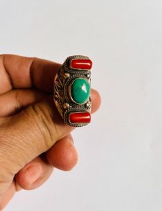 This traditional Tibetan saddle ring is made in Nepal.  Made by wonderful artist  with a great quality old corals, turquoise and 9.25 silver. it has beautiful design and good energy. In Tibet, this kinds of  ring is one of the best one to choose for special occasion.  size of the ring is  U.S 6 Traditional Silver Turquoise Ring, Traditional Turquoise Gemstone Ring, Traditional Silver Turquoise Ring With Inlay, Traditional Sterling Silver Turquoise Ring, Traditional Handmade Silver Turquoise Ring, Traditional Sterling Silver Turquoise Gemstone Ring, Saddle Ring, Good Energy, Tibet