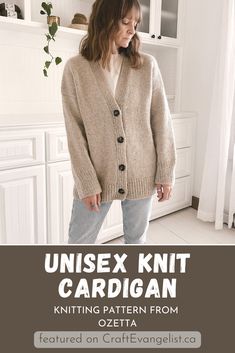 a woman standing in a kitchen wearing an unisex knit cardigan knitting pattern