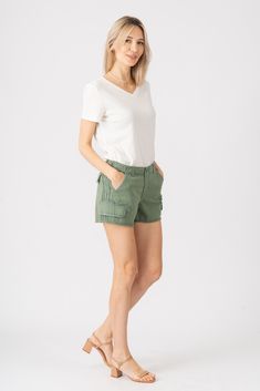 DAS062TWWMGN - MYRTLE GREEN DETAILS SHORTS WITH RAW STRIPES AT SIDE SEAMS 2 SIDE POCKETS, BUTTON CLOSURE, ZIP FLY RAW HEM. CONTENT 100% COTTON MACHINE WASH COLD FIT MODEL IS 5'10" & WEARING SIZE S. Green Summer Tops With Pockets, Short Green Cotton Bottoms, Casual Green Shorts For Spring, Green Cotton Bottoms With Short Length, Green Cotton Bottoms Of Short Length, Green Cotton Cargo Shorts For Spring, Casual Green Short Bottoms, Casual Green Cargo Shorts For Summer, Green Cotton Short Top