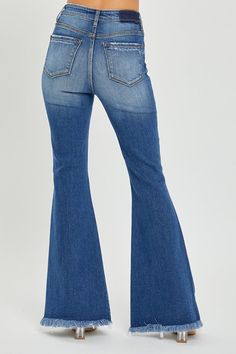 Enhance your wardrobe with these trendy and stylish RISEN High Rise Front Slit Frayed Hem Flare Jeans. The high-rise design flatters and elongates your legs, while the front slit adds an edgy touch. The frayed hem and flared silhouette create a cool, retro look perfect for casual outings. Pair with a blouse or crop top for a chic ensemble. How to figure out your best fit Risen jean sizing We mark our Risen jeans as true to size because they are very close to our US size guide. If you prefer your Romper Dress, Plus Size Tops, Bell Bottom Jeans, Flare Jeans, Plus Size Dresses, Jumpsuit Dress, Outfit Sets, Knit Top, Jumpsuit Romper