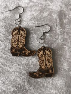 These super fun country and western inspired earrings will make a great addition to your wardrobe. Made from wood, these novelty earrings are unique and different. Earrings come mounted onto seeded earring cards. So simply rip up, plant and watch the flowers grow! An extra little gift that will keep on giving. Western Style Earrings For Gifts, Handmade Western Dangle Earrings, Cowgirl Earrings, Cowboy Accessories, Country And Western, Earrings Western, Country Cowboy, Novelty Earrings, Earring Cards