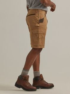 MADE TO HELP YOU BEAT THE HEAT When warmer weather strikes, our ranger workwear cargo short has you covered. Fully equipped with everything you might need on the clock, these cargo shorts come with two front pockets, lined back patch pockets, roomy side cargo pockets with flaps and concealed snaps, as well as a tape measure patch. They also feature a relaxed fit to keep you comfortable and a gusseted crotch to give you extra room where you need it most. Best of all, they’re crafted from 100% cot Khaki Cargo Shorts For Outdoor Work, Utility Cargo Shorts With Relaxed Fit For Outdoor, Utility Cargo Shorts For Outdoor Work, Fitted Brown Bottoms For Outdoor, Fitted Outdoor Shorts With Pockets, Outdoor Fitted Shorts With Pockets, Brown Utility Cargo Shorts With Side Pockets, Brown Utility Shorts With Multiple Pockets, Utility Brown Shorts With Multiple Pockets