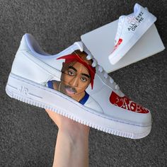 Custom Air Force 1 including a portrait of Tupac, his cross tattoo "Exodus 1831" and a bandana pattern. * handpainted in Germany * unique and individual manufacturing * waterproof & scratch resistant * 1-2 weeks processing time INDIVIDUAL DESIGN Customizations or a completely own design? Text to me here or on Instagram (@annamarie_diy) ♥︎ Your dream shoes with: * Colors: Normal, Metallic, Neon, Glow in the Dark, Colorshifting, Sunlight sensitive * Glitter, rhinestones (e.g. Swarovski) * Engraved Custom Air Force 1 Design, Tupac Design, 2pac Shakur, Painted Nikes, Custom Jordans, All Eyez On Me, Unique Sneakers, Shoes Diy, Custom Air Force 1