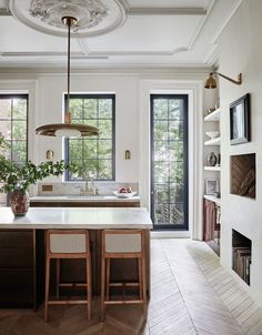 the kitchen is clean and ready to be used as a dining room or living room