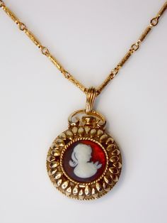 This vintage necklace from Sarah Coventry is a stunning piece of jewelry that features a beautiful cameo perfume locket pendant and adds a touch of elegance to any outfit.  You will receive: (What you see in the images) - 1 Vintage Cameo Perfume Locket Pendant Sarah Coventry  - Chain is 24" - Pendant is 1 3/8" inches Contact me through Etsy messaging with any questions. All vintage items are hand picked for quality and uniqueness, so you can feel special wearing an authentic piece of the past. T Athena Jewelry, Perfume Locket, Vintage Cameo, Sarah Coventry, Vintage Stuff, Purse Accessories, Feel Special, Vintage Costumes, Hand Picked