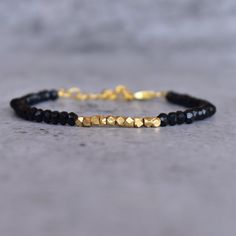 ✦ Enjoy the subtle regal flair of silver and gold beads that glow beautifully against the deep black onyx beaded bracelet , enhancing its charm and wearability. This bracelet is made with natural black onyx tiny faceted beads and mixed with silver or gold beads, giving it an eye-catching balance of both sophistication and luxury. It's a great piece to wear either alone or paired with other jewelry - or give as a wonderfully thoughtful gift for a special someone! Sparkle and shine in this beautif Black Stone Jewelry, Citrine Earrings Studs, Beaded Jewelry Bracelets, Silk Bracelet, Trending Bracelets, Rose Quartz Jewelry, Black Onyx Bracelet, Tourmaline Bracelet, Onyx Jewelry