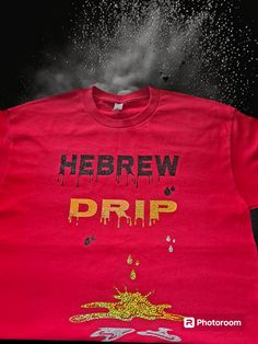 * You have the option to choose what colors of vinyl to be used. * If you want fringes please select your size with the add fringe option.  Add some drip to your wardrobe with this Hebrew Israelite Drip T-shirt. Choose from holographic or glitter designs, and customize your colors to show off your unique fashion sense. This eye-catching tee is perfect for anyone who wants to flaunt their heritage with style. Machine Washable: Care for this shirt is easy - turn it inside out and toss it in the washing machine on a cold cycle. Short Sleeves: Stay cool and comfortable in warmer weather with the short sleeves on this tee. Crew Neckline: The classic crew neckline adds a touch of street style to any outfit. This Hebrew Israelite Drip tee is the perfect addition to any fashion-forward wardrobe. W Drip Tshirt, Hebrew Israelite, Style Streetwear, Tri Color, Fashion Sense, Unique Fashion, Crew Neckline, Fashion Forward, Inside Out