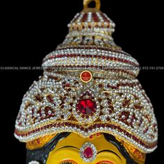 Design by Classical Dance Jewelry® ❥ Product Details: Designer Goddess Varalakshmi Ammavaru Face ❥ Material is mixed Alloys ❥ Color: Yellow and Gold ❥ Beautiful Goddess Lakshmi face set used for varalakshmi Vratham ❥ Beautifully decorated mask used for pooja during Varalakshmi Vratham ❥ Completely Decorated with High Quality Stones and pearls 🎈We will send item that are in stock close to the sample picture.🎈 ❥❥❥❥ Height of face : 7 - 8 Inchs ❥❥❥❥ Set includes ☛ Lakshmi Face : 1 ❇️ Ammavaru Fac Red Tikka For Navratri, Red Tikka For Puja And Festivals, Navratri Celebration Tikka With Cutdana, Red Tikka For Festivals, Festival Tikka With Stone Work, Festival Celebration Tikka With Cutdana, Red Traditional Wear With Latkans For Festivals, Bollywood Style Tikka For Rituals With Zari Work, Red Meenakari Traditional Wear For Rituals