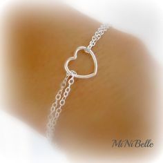 Welcome simple heart bracelet... details: sterling silver cable chain and clasps sterling silver heart measures 10mm from side to side please select desired length at checkout! Custom Orders Welcome! Silver Heart Charm Jewelry For Bridesmaid, Sterling Silver Heart Charm Bracelet For Wedding, Sterling Silver Charm Bracelet For Wedding Valentine's Day, Minimalist Sterling Silver Heart Bracelet For Mother's Day, Sterling Silver Charm Bracelet For Wedding On Valentine's Day, Sterling Silver Heart Bracelet For Wedding And Mother's Day, Dainty Silver Charm Bracelet For Bridesmaid Gift, Silver Minimalist Heart Bracelet For Valentine's Day, Minimalist Sterling Silver Heart Bracelet For Gift