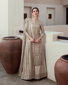 Ash Grey Kameez Salwar for Pakistani Wedding Dresses is adorned with a long kameez lehenga heavily prepared to give a regal & elegant look. Fast Shipping