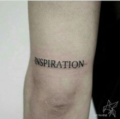 a person with a tattoo on their arm that says inspiration