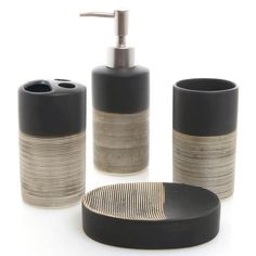 three pieces of black and gold bathroom accessories