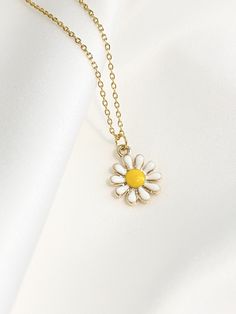 "--NATURE COLLECTION-- This adorable and tiny daisy flower necklace is perfect for casual, special occasions or date night. Makes a great gift for Best Friends, Birthdays, Mother's Day, Wedding, Anniversary or any occasion. Choose between 6 beautiful necklace pendants representing the graceful beauty of nature. 1. Tiny Sparkly Bee (12mm x 12mm) 2. Dainty Butterfly (12mm x 10mm) 3. Golden Dandelion (10mm x 16mm) 4. Golden Cactus (9mm x 18mm) 5. Tiny Daisy (11mm x 11mm) 6. Dainty Monstera (16mm x Cute Necklaces For Spring Gift, Cute Spring Necklace As A Gift, Cute Spring Necklace For Gift, Cute Spring Gift Necklaces, Summer Flower Pendant Necklace Gift, Cute White Necklaces For Spring, Dainty Flower Charm Necklace For Summer, Dainty Summer Necklace With Flower Charm, Gold Flower Necklace For Summer Gifts