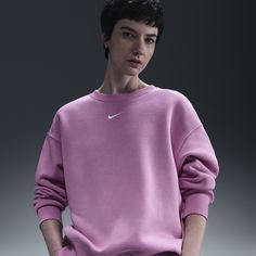 Grounded in style, comfort and versatility, meet our take on luxury loungewear. This classic sweatshirt helps you stay cozy all day long, thanks to its midweight fleece that feels soft yet structured. Plus, the taller ribbing and oversized fit give you a trend-right look. Nike Relaxed Fit Athleisure Sweats, Nike Athleisure Sweats With Relaxed Fit, Cozy Nike Sweats, Nike Cotton Sweatshirt For Loungewear, Pink Athleisure Sweatshirt For Leisure, Sportswear Sweatshirt For Loungewear, Nike Relaxed Fit Crew Neck Sweats, Oversized Athleisure Sweats For Leisure, Relaxed Fit Sportswear Top For Loungewear