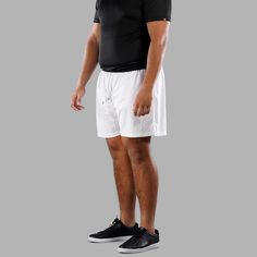 Stay active and stylish with our SLF Mesh Shorts. Crafted from soft, lightweight mesh fabric, these shorts ensure maximum breathability, making them perfect for any adventure. The trendy design features a longer 9-inch leg length, providing comfort and coverage, while the elastic stretch waistline offers a standard fit that conforms to your body. Equipped with practical side pockets, you can easily stash your essentials like your phone or keys, allowing you to focus on what truly matters - stayi Mesh Shorts, Stay Active, Athletic Outfits, Mesh Fabric, White Shorts, Trendy Fashion, Design Features, Mesh, Elastic