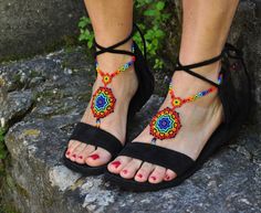 This listing is for a PAIR of beautiful and UNIQUE barefoot sandals handmade in the HUICHOL style. Made of high quality Japanese myuki seed beads and extra strong nylon thread. They make a beautiful combination with the leather sandals (pictures 4,7 and 10) also available in my shop. These sandals are very resistant and suitable for many environments. They will embellish your feet and you can wear it with sandals in a variety of styles from work to casual to evening attire. Beautiful to wear on Multicolor Handmade Huarache Sandals For Festivals, Handmade Bohemian Huarache Sandals For Beach, Handmade Bohemian Sandals For Festival, Bohemian Handmade Huarache Sandals For Beach, Bohemian Toe Ring Sandals With Beads, Handmade Bohemian Festival Sandals, Handmade Adjustable Huarache Sandals For Festival, Bohemian Handmade Sandals For Festival, Handmade Bohemian Sandals With Ankle Strap