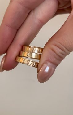 Customize our 4 mm band with your initials or short word. Designed with a 4 mm wide band stamped with capitalized letters. Enter up to 5 letters in the txt box above 14k gold filled Made to withstand daily wear time after time + water resistant Gold Stackable Rings With Initials For Everyday, Everyday Gold Stackable Rings With Initials, Classic 14k Gold Stackable Rings With Initials, Personalized Initial Ring In 14k Gold With Round Band, Personalized 14k Gold Initial Ring With Round Band, Classic Engraved Monogram Ring For Everyday, Classic Monogram Engraved Ring For Everyday, Gold Engraved Ring With Initials For Everyday, Personalized Gold Initial Ring With Round Band