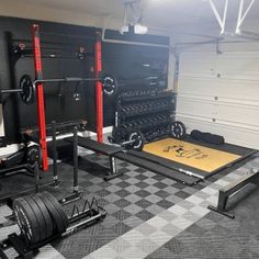 a home gym with black and white checkered flooring