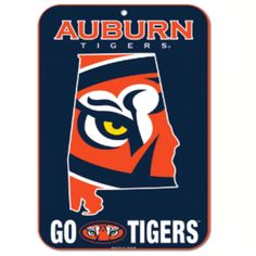 the auburn tigers logo is shown on an orange and blue license plate that reads, go tigers