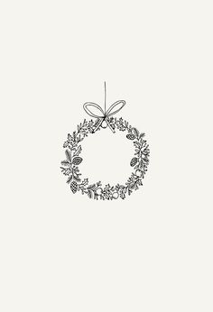 a black and white drawing of a wreath