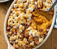 a casserole dish filled with sweet potato casserole