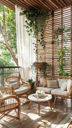 an outdoor living room with wicker furniture and plants