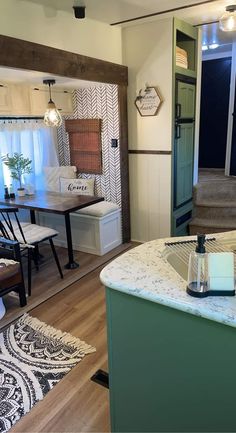 the kitchen is clean and ready to be used as a dining room or living room