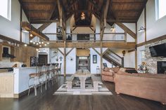 a large open living room with high ceilings