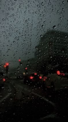 rain drops on the windshield of a car