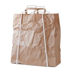 a brown paper bag with handles on a white background