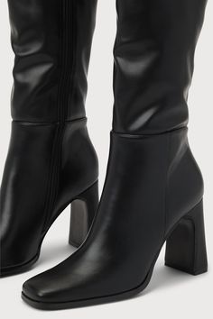 Strut into any room with effortless style with the Lulus Ceceliaa Black Square Toe Knee-High Boots! Smooth faux leather shapes these must-have boots that start with a squared-toe upper that rises to 16"" knee-high shaft with a 15"" circumference and an 18"" zipper at the instep. A sculpted block heel completes the effortlessly chic design! 3. 75" sculpted block heel. Lightly cushioned insole. Felted rubber sole has nonskid markings. Man made materials. Imported. Lulus | Ceceliaa Black Square Toe Trendy Tall Mid-calf Leather Boots, Modern Knee-high Boots With Stacked Heel And Round Toe, Knee-high Heeled Boots With Padded Heel, Fitted Synthetic Boots With Block Heel, Wide Calf Synthetic Boots With Padded Heel, Medium Width Synthetic Boots With Block Heel, Trendy Knee-high Heeled Boots With Padded Heel, Trendy Knee-high Boots With Reinforced Heel, Medium Width, High Heel Faux Leather Boots With Padded Heel