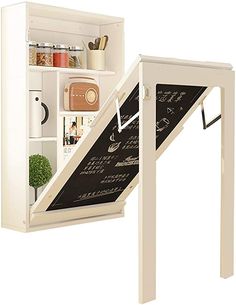 an open white wall mounted cabinet with chalkboard