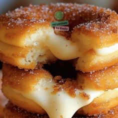 a stack of doughnuts covered in icing