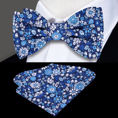 Blooms of Elegance: The Shades of Blue and White Floral Silk Bow Tie A Garden of Style Blooms in Every Knot In the world of men's fashion, a bow tie is not just an accessory; it's an emblem of style and individuality. Our Shades of Blue and White Floral Silk Bow Tie transcends traditional boundaries, offering a garden of intricate flowers that tell a story of elegance and sophistication. In this blog post, we immerse ourselves in the details of this silk masterpiece, exploring styling options, p Classic Blue Bow With Butterfly Knot, Blue Wedding Ties With Decorative Bow, Summer Blue Bow Tie And Accessories, Summer Blue Bow Tie And Suit Accessories, Summer Blue Bow Tie Suit Accessories, Blue Bow Tie For Summer Weddings, Blue Bow Tie For Wedding And Father's Day, Blue Bow With Butterfly Knot For Wedding, Blue Bow Gift For Summer