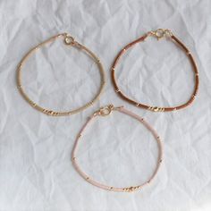 Delicate Adjustable Gold Beaded Bracelets, Handmade Rose Gold Beaded Bracelets For Everyday, Dainty Gold Beaded Bracelets For Everyday, Dainty Beaded Bracelets With Gold Beads For Everyday, Delicate Everyday Beaded Bracelets, Dainty Rose Gold Beaded Bracelet With Tiny Beads, Delicate Stackable Beaded Bracelets With Round Beads, Dainty Everyday Beaded Bracelets With Tiny Beads, Delicate Tiny Beaded Bracelets For Everyday