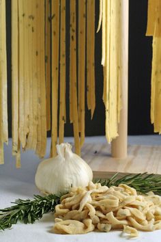 some pasta and garlic on a table