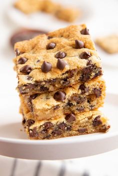 three chocolate chip cookie bars stacked on top of each other