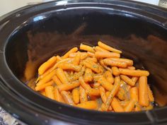 carrots are being cooked in the slow cooker