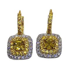 Yellow Sapphire 2.31 carats with Yellow Sapphire 1.14 carats and Diamond 1.04 carats Earrings set in 18 Karat White Gold Settings Width: 1.5 cm Length: 2.5 cm "Since we first opened doors in 1980 our store was then situated in the vicinity of the Victory Monument; a small and modest storefront with a couple of counters. From our humble beginnings to where we stand today, we has proven our abilities as a jeweler. From the 80s up til today, we have been supplying fine quality pieces to dealers, wh Canary Diamond, Butterfly Shoes, Sabyasachi Jewellery, Sapphire And Diamond Earrings, Women Diamond, Yellow Sapphire, Sapphire Diamond, Girls Best Friend, Earrings Set