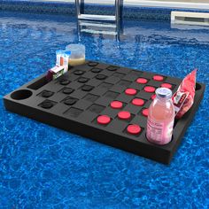 a pool with a drink and game on it