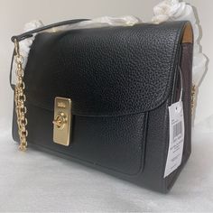 Coach Lane Shoulder Bag New With Original Packaging 100 % Authentic Black Multi With Gold Hardware Refined Pebble Leather Snake-Embossed Leather Inside Multifunction Pocket Center Zip Compartment Turnlock Closure Outside Open Pocket Handles (Convertible) To Shoulder Strap With 19 1/4" Drop Approximate Measurements 10 1/4" L X 7" H X 4" W Designer Bags With Turn-lock Closure For Daily Use, Elegant Flap Satchel With Metal Hardware, Designer Office Bags With Turn-lock Closure, Workwear Shoulder Bag With Turn-lock Closure, Work Bags With Gold-tone Hardware And Flap, Workwear Bags With Gold-tone Hardware And Flap, Black Flap Bag With Turn-lock Closure For Office, Flap Bags With Turn-lock Closure For Office, Workwear Bags With Flap And Turn-lock Closure