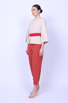 This sophisticated three-quarter sleeve blouse combines Kenyan vibrant hues with Danish minimalism. The highlight of this piece is the exquisite flower cut-out detail at the back, adding a unique and artistic flair that sets you apart from the crowd. The hidden front zipper closure ensures a smooth, sleek look, making it easy to dress up or down depending on your day.  Ideal for the office, art galleries, or a chic evening out, this blouse effortlessly blends elegance with a touch of whimsy. Wit Danish Minimalism, The Office Art, Animal Print Party, Three Quarter Sleeve Blouses, Flower Cut Out, Wedding Gifts For Groom, Shirt Blouses Women's, Summer Capsule Wardrobe, July Birthstone Jewelry