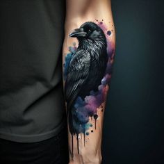 a person with a black crow tattoo on their arm