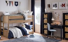 a child's bedroom with bunk beds and desks