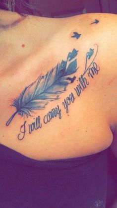 a woman with a tattoo on her shoulder that says, i will carry my feathers