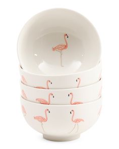 four bowls with flamingos painted on them are stacked in front of the same bowl