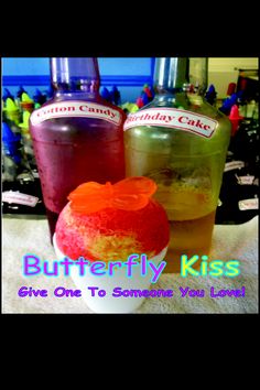 two drinks are sitting next to each other on a table with the caption butterfly kiss give one to someone you loved