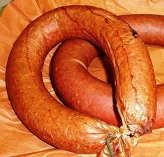 two large sausages sitting on top of each other