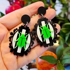 Brand New Pair Of Acrylic Halloween Earrings. On A Black And White Striped Victorian Frame There Is A Bright Green Beetle Insect. It Is So Much Fun With Its Creepy Crawler Look. Beetlejuice Inspired Jewelry, Beetle Earrings, Halloween Green, Green Beetle, Halloween Goth, Victorian Frame, Beetle Insect, Goth Jewelry, Beetlejuice